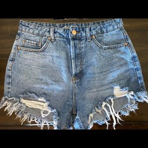 Ripped Blue Jean Shorts